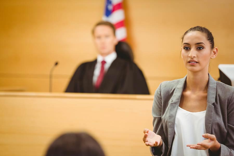Using an Alibi to Defend Against Criminal Charges woman in court - Using an Alibi to Defend Against Criminal Charges